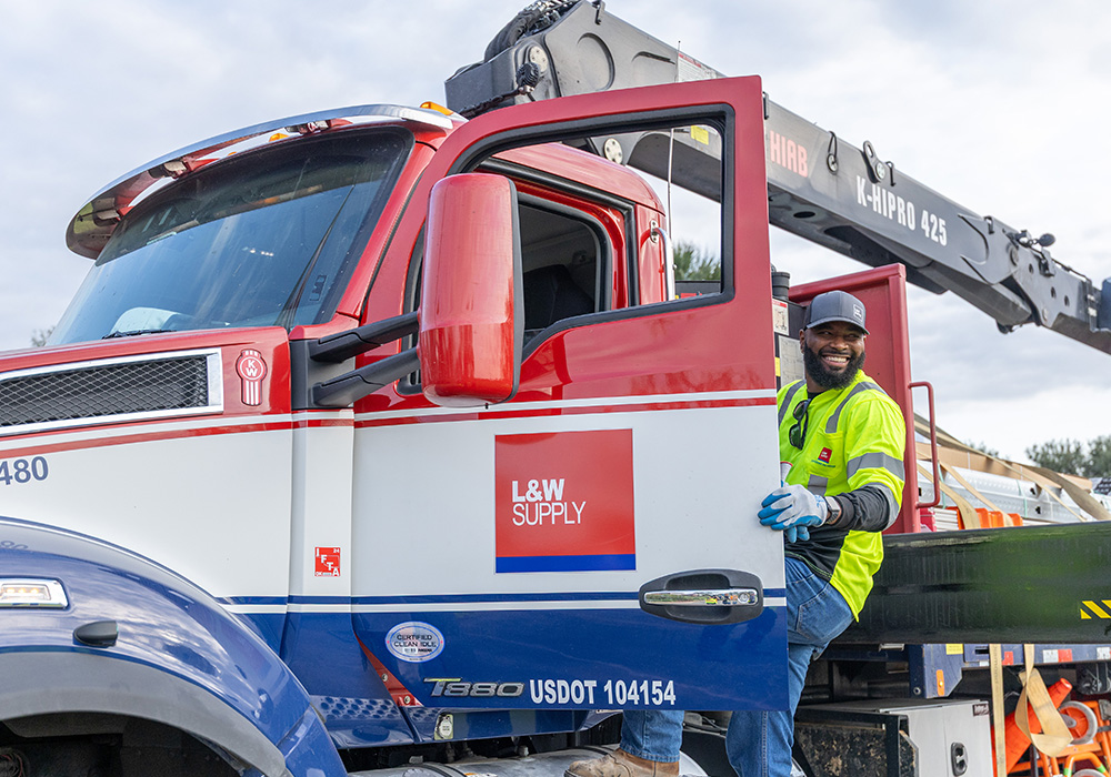 man stepping in a truck