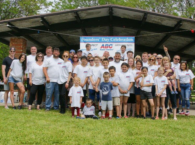 Employees and family gathered at founders celebration