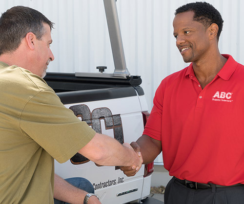 Branch Manager shaking customers hand