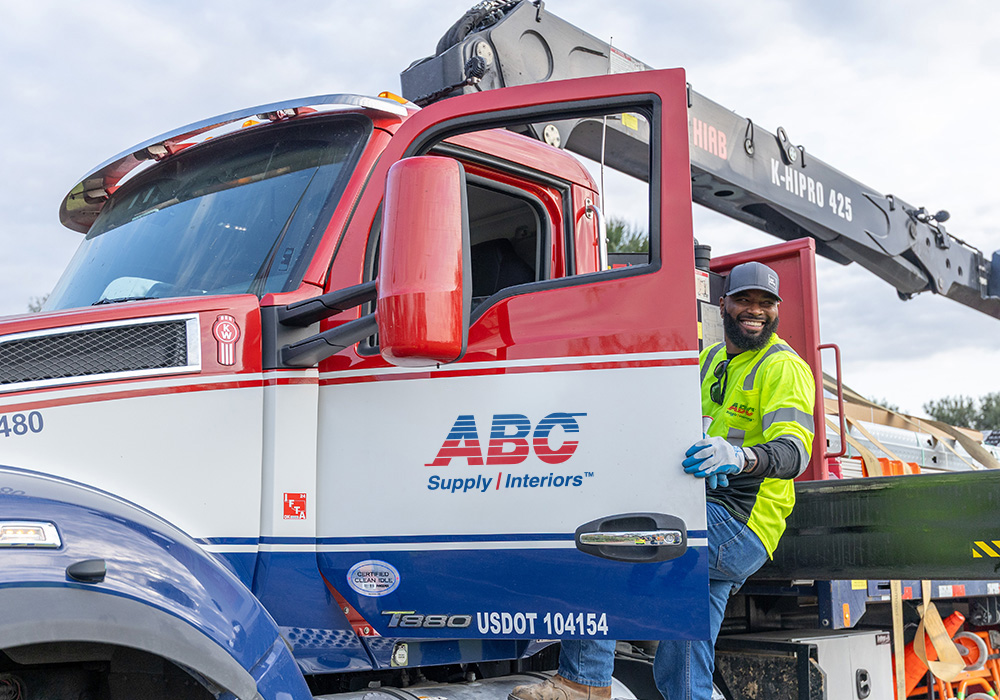 Man stepping into an ABC Interior Supplies truck